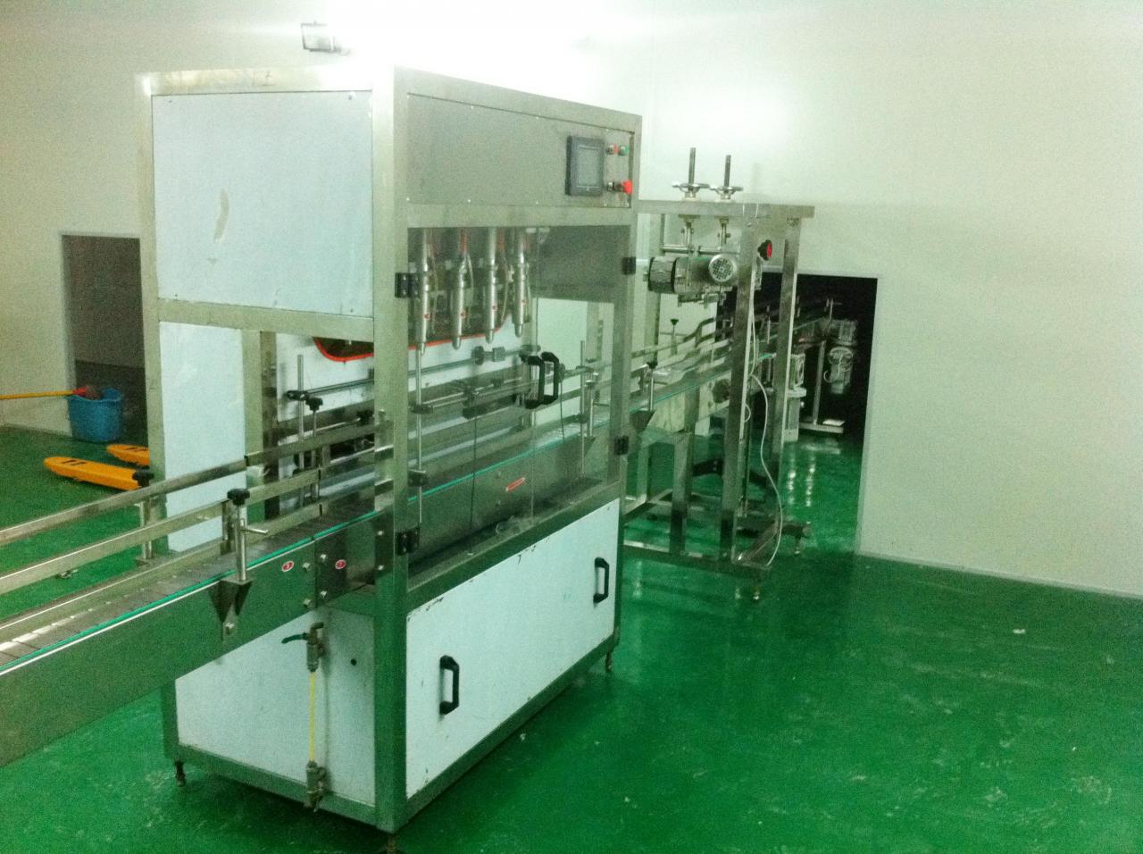 Linear filling machine with 4 filling heads LINEARNI STROJ ZA PUNJENJE.jpg