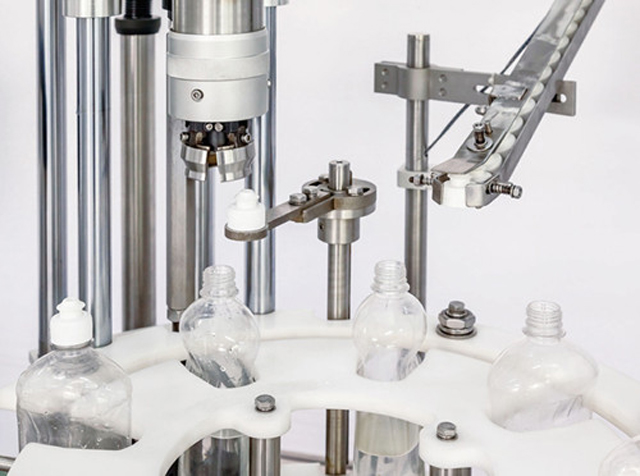 capping head close shot detalji stroja za pojedinačno zatvaranje.jpg