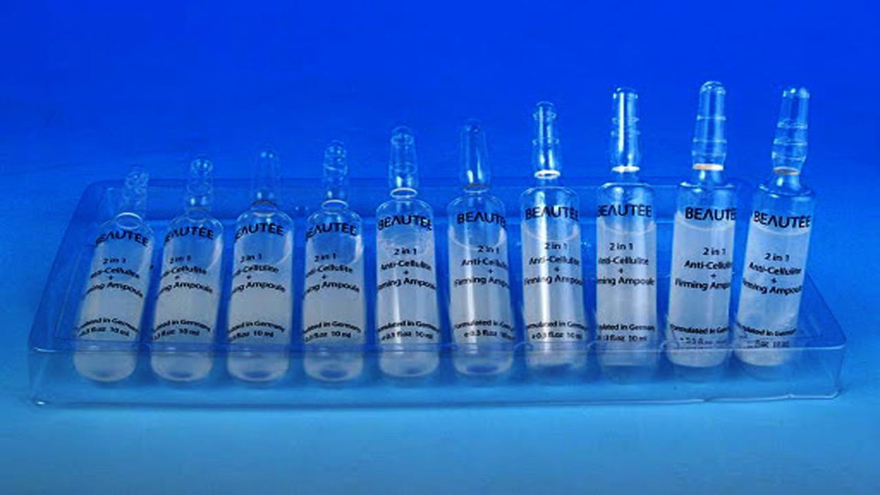 liquid solution bottles labeling machine samples final products bočice za ampule.jpg