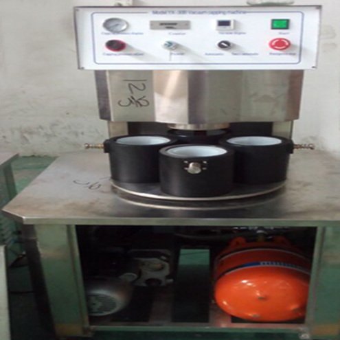 illustration of vacuum capping machine semi automatic ilustracija za vakumiranje.jpg